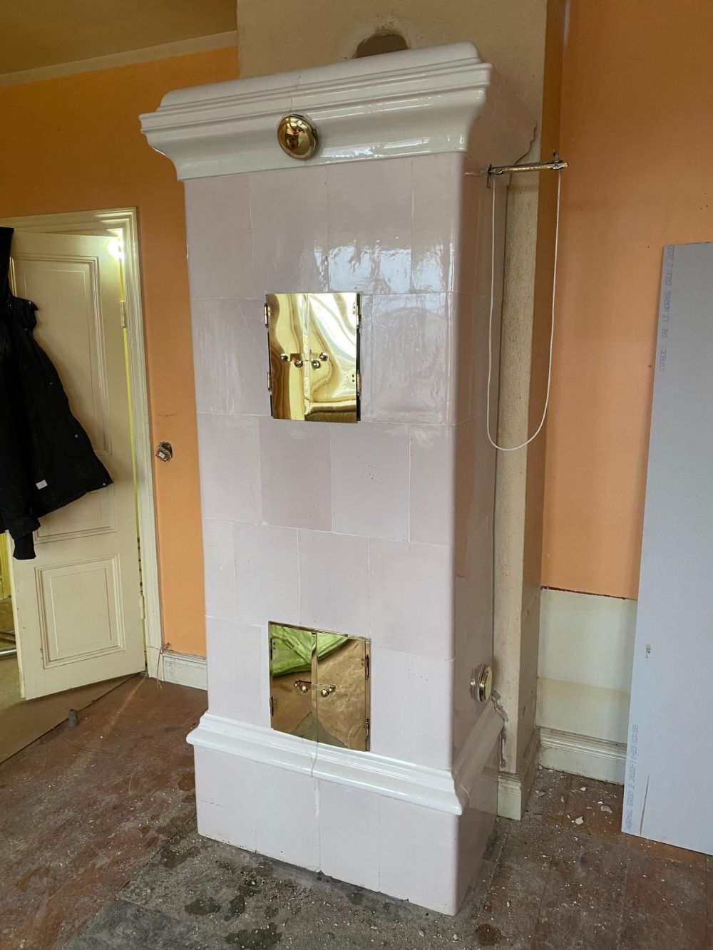cleaning the tiled stove